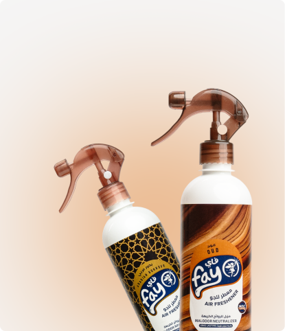 Two Fay air freshener bottles on a beige background